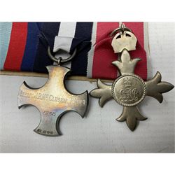 WW2 Royal Naval group of eight medals comprising OBE, hallmarked silver Distinguished Service Cross inscribed verso Lieut. J.R. McCluskie RNVR 1945, 1939-1945 Star, Atlantic Star, Africa Star, 1939-1945 War Medal, Defence Medal and Royal Naval Patrol Service Medal inscribed Lieutenant J.R. McCluskie Royal Naval Patrol Service; with seven original photographs of a sea battle 27th November 1940 against the Italian Fleet and another photographic postcard of Sir Stafford Cripps arriving on board one of the vessels.