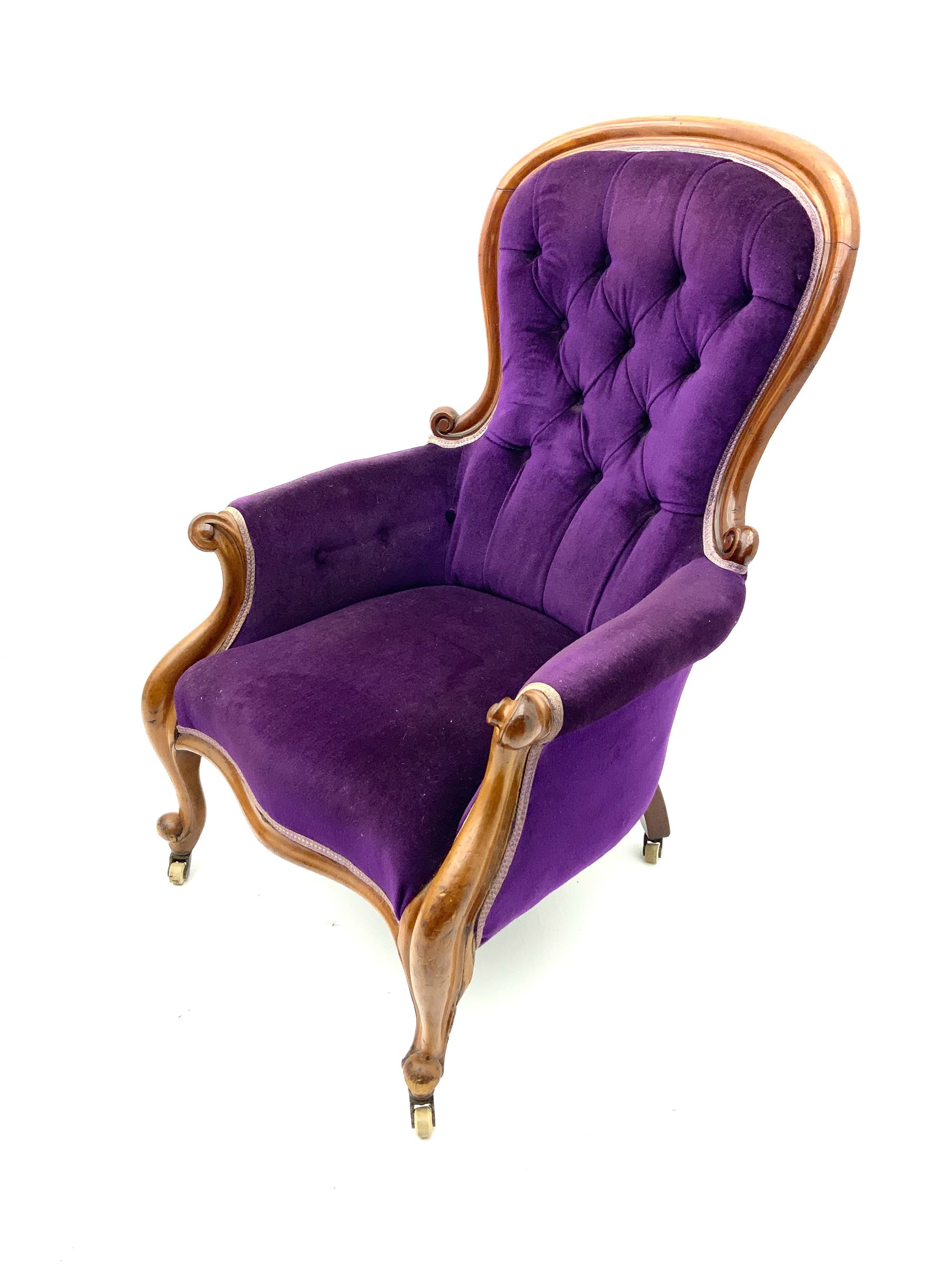 Victorian walnut framed upholstered armchair, blue velvet cover