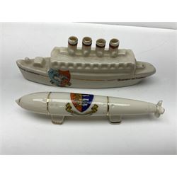 Ten WW1 crested china military models comprising submarine, four ships including Lusitania, four Zeppelins/balloons and an aircraft; various makers including Arcadian China, Swan China, Carlton China, Waterfall, Grafton China etc; various crests including Saint Neots, Great Yarmouth, Tewksbury, Swanage, Simons Town, Hull etc (10)