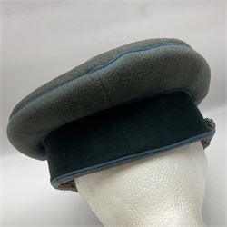 WW2 German Infantry Officer's visor cap with cloth insignia; labelled and stamped Offizier Kleiderkasse Berlin and Erel Stirnschutz