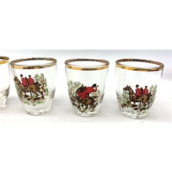  A collection of hunting related items, comprising a pair of Caverswall beakers, each with twin gilt fox head handles, H11.5cm, a limited edition Spode cabinet place depicting 'Drawing the Dingle' after J F Herring Sen, D24cm, and a set of six French shot glasses, decorated with huntsmen on horseback and hounds, H5.5cm.  