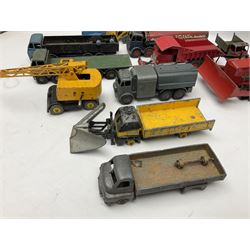 Dinky - twenty-six unboxed and playworn die-cast models including Foden Regent Tanker, two Foden lorries, Pressure Refueller No.642, Snow Plough, Elevator Loader, Foden Dump Truck, Blaw Knox Bulldozer and other commercial vehicles
