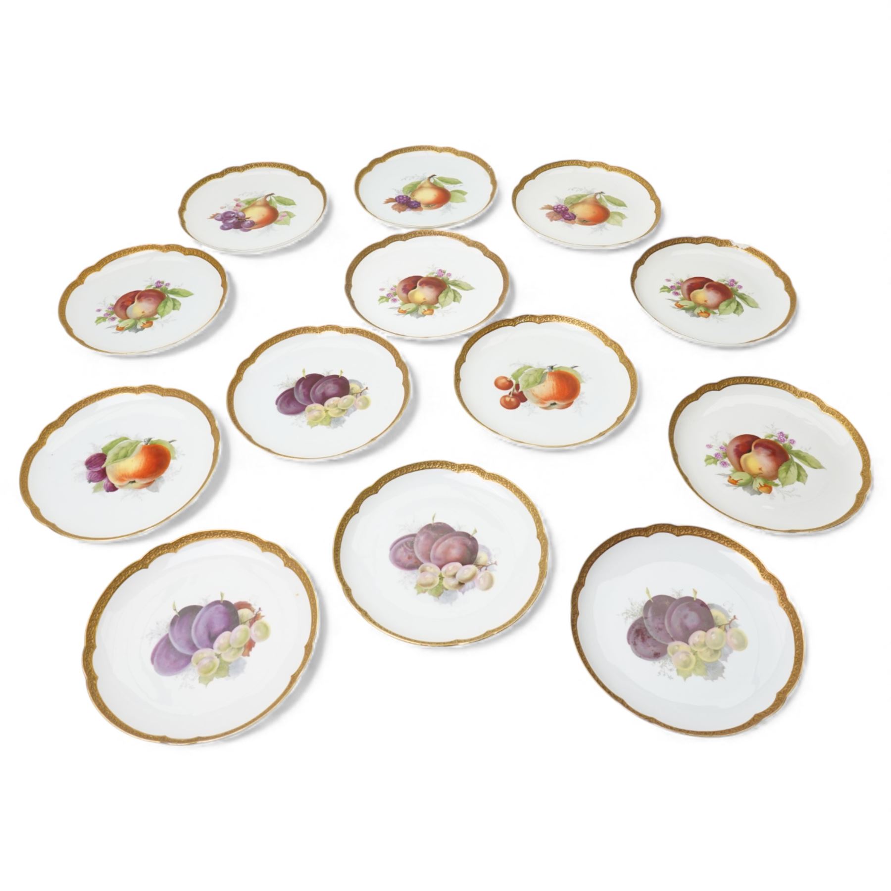 Set of thirteen Rosenthal hand-painted fruit decorated cabinet plates, within floral gilt borders, printed marks to base 