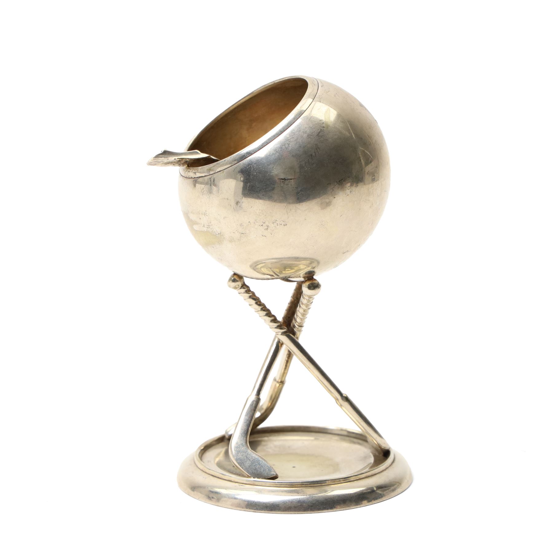 Pair of Swedish silver pepperettes with loop handles, small Middle Eastern silver octagonal salt, unmarked but tests 94 standard, pair of silver gilt and enamel cufflinks and a plated ashtray with golfing motifs