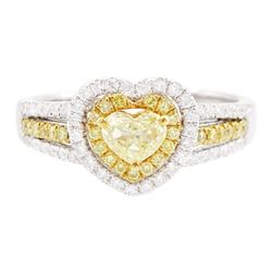 18ct white gold diamond heart cluster ring, principal heart cut fancy yellow diamond of ap...
