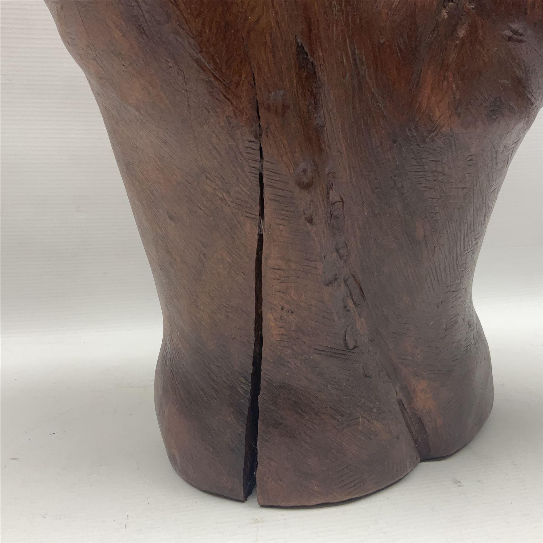 Helen Skelton (British 1933 – 2023): Large carved wooden sculpture, modelled as a male torso, H40cm. Born into an RAF family in 1933 in Kent and travelled the world extensively during her childhood. After settling in Bridlington, Helen immersed herself in painting, textiles, and wood sculpture, often inspired by nature's beauty. Her talent was showcased in a one-woman show at Sewerby Hall and recognised with the sculpture prize at Ferens Art Gallery in 2000. Sadly, Helen’s daughter passed away from cancer in 2005. This loss inspired Helen to donate her sculptures to Marie Curie upon her passing in 2023.