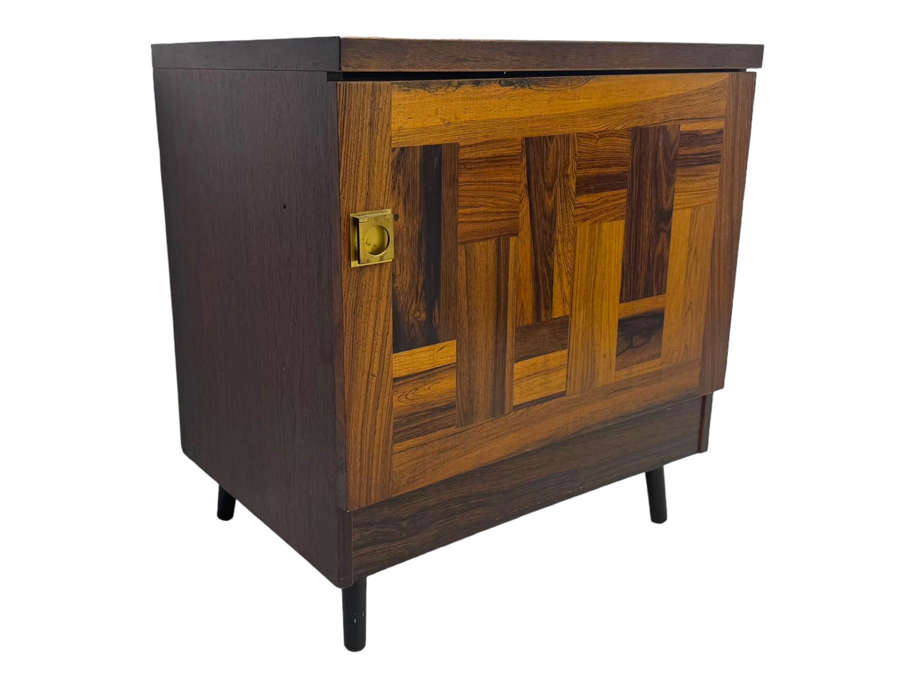 Troeds of Sweden - mid-20th century rosewood veneered cupboard, single door with brass handle enclosing interior fitted with one drawer, raised on ebonised tapered and splayed supports