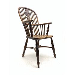 Early 19th century elm and yew wood double hoop Windsor armchair, high stick and pierced splat back, turned supports joined by crinoline and swell-turned stretchers