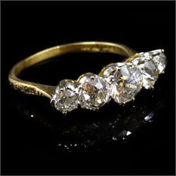  Five stone graduating diamond ring, diamond set shoulders, stamped 18ct Plat, central diamond approx 0.8 carat  