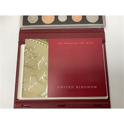 Four The Royal Mint United United Kingdom proof coin sets, dated 1999, 2001, 2002 and 2003, all in red cases with certificates 