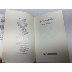 Collection of twenty-three hardback Terry Pratchett books, comprising approximately eighteen first editions including The Fifth Elephant signed & inscribed by Pratchett, all with dustjackets