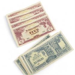 Royal Mint Royal Shield of Arms Brilliant Uncirculated coin collection, a framed 'Royal Family Collection' set of three coins and a collection of twelve Japanese Government ten dollar notes and four five dollar notes 
