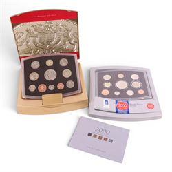 The Royal Mint United Kingdom 2000 Deluxe Proof set and The Royal Mint United Kingdom 2003...