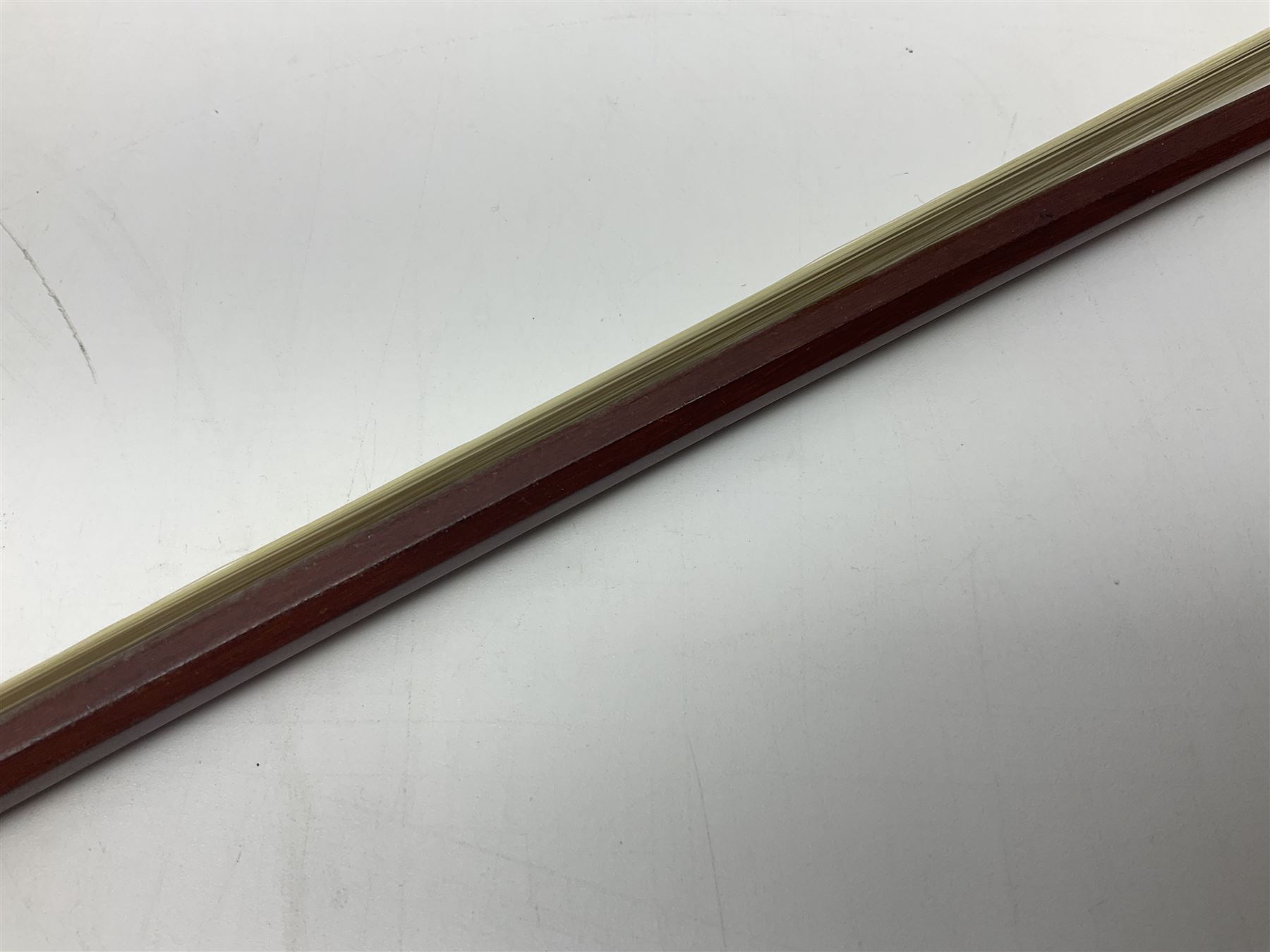 Nickel mounted pernambuco violin bow stamped R. Paesold L73.5cm