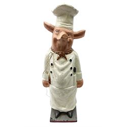 20th century, cast iron doorstop, in the form of a pig dressed in chef whites, H57cm