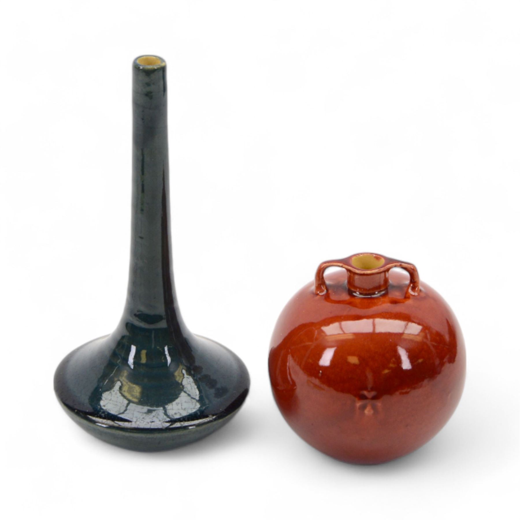 Early 20th century Jugenstijl vase by Aardewerkfabriek De Kat, Bergen op Zoom Pottery (1902-1918) attributed to Chris van der Hoef, of twin handled globular form in pinkish red glaze with cross motif to the body, impressed marks beneath, H11cm and another of angular form with elongated neck and blue glaze, H21cm