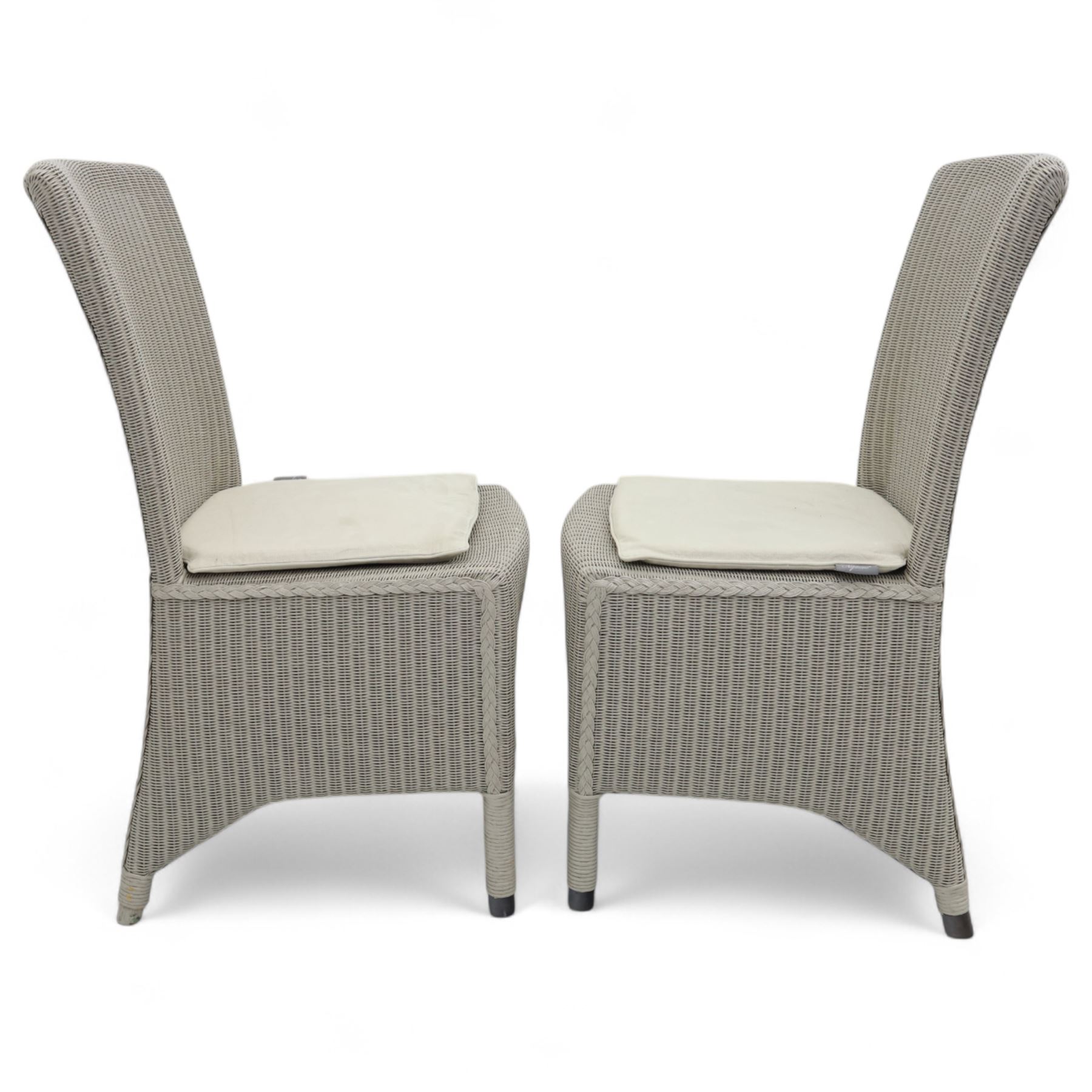 Neptune – Sheldrake limed oak extendable dining table and eight Havan loom chairs, the oval top in limed oak finish with four additional leaves extending the table to seat up to ten (Extends to cm), raised on turned legs with two additional centre supports, the matching Havan loom chairs finished in grey with cream upholstered seat covers (H 95cm, W 47cm, D 55cm)