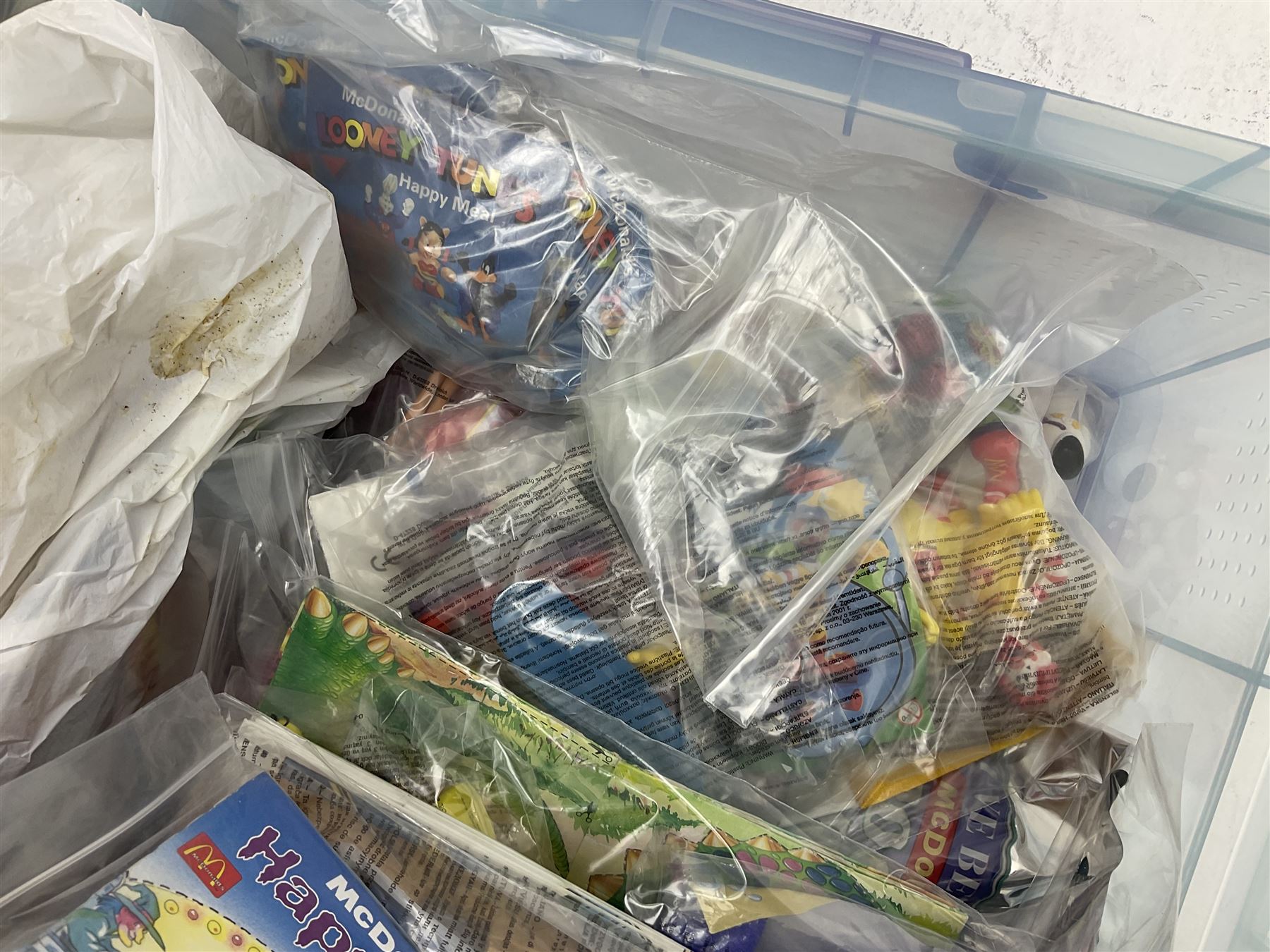 Large quantity of Mcdonalds toys to include Snoopy figures in two boxes