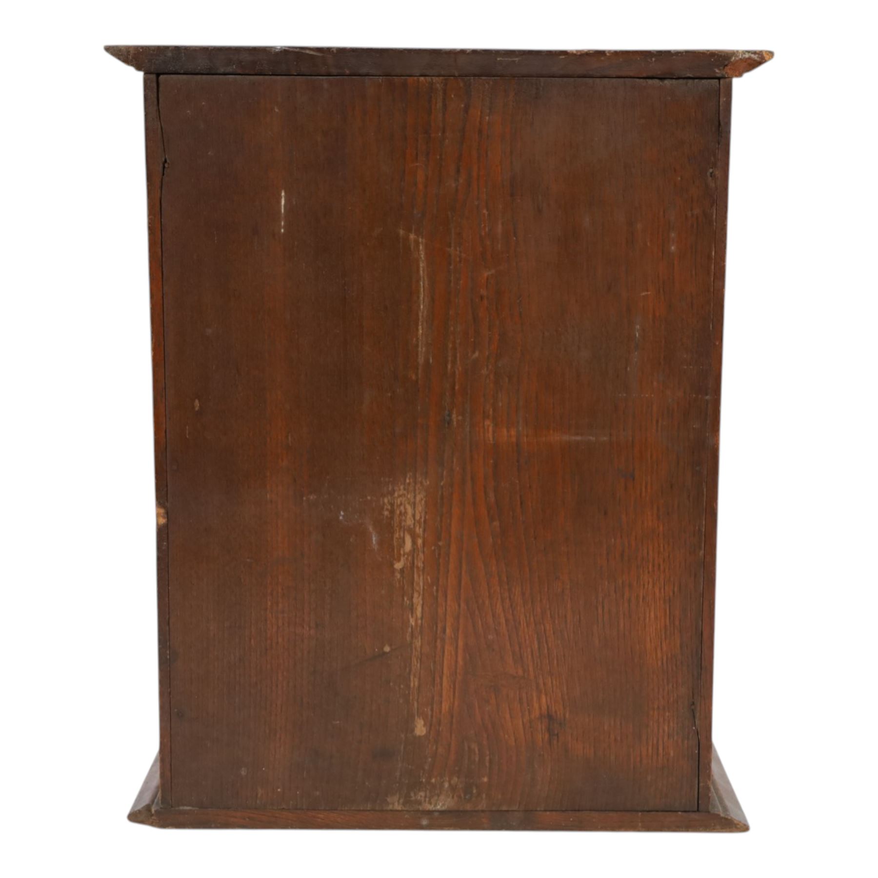 Oak smoking cabinet, with hinged lid, the glazed door opening to reveal a fitted interior, over a single drawer, together with a wooden tobacco box with lid, cabinet H39cm