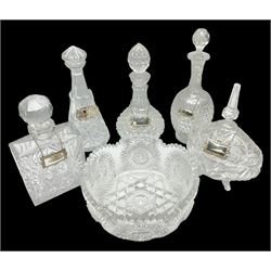 Cut glass bowl, together bonbon dish and cover, four decanters, and five wine labels
