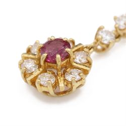 Pair of 18ct gold ruby and diamond pendant earrings, each stud set with a single round cut ruby, surrounded by six round brilliant cut diamonds, suspending from two further round brilliant cut diamonds, total ruby weight approx 0.60 carat, total diamond weight approx 1.10 carat