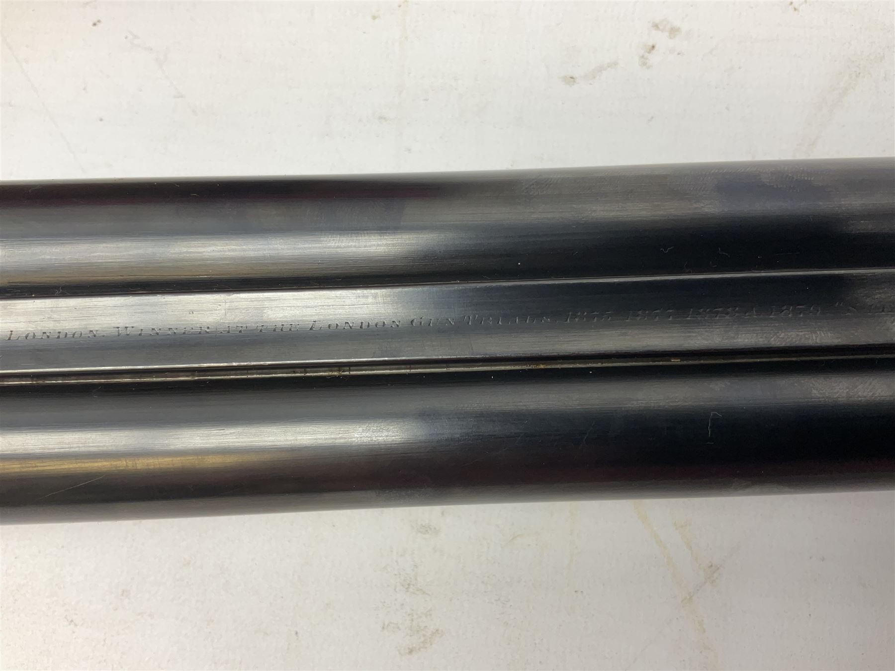 W.W. Greener 12-bore side-by-side double barrel non-ejector shotgun, with 76cm barrels, side safety, engraved lock, figured walnut stock with chequered grip and fore-end, no.33408, 120.5cm overall; in fitted canvas covered case with tools and accessories including .22 12-bore dog training device. SHOTGUN CERTIFICATE REQUIRED.