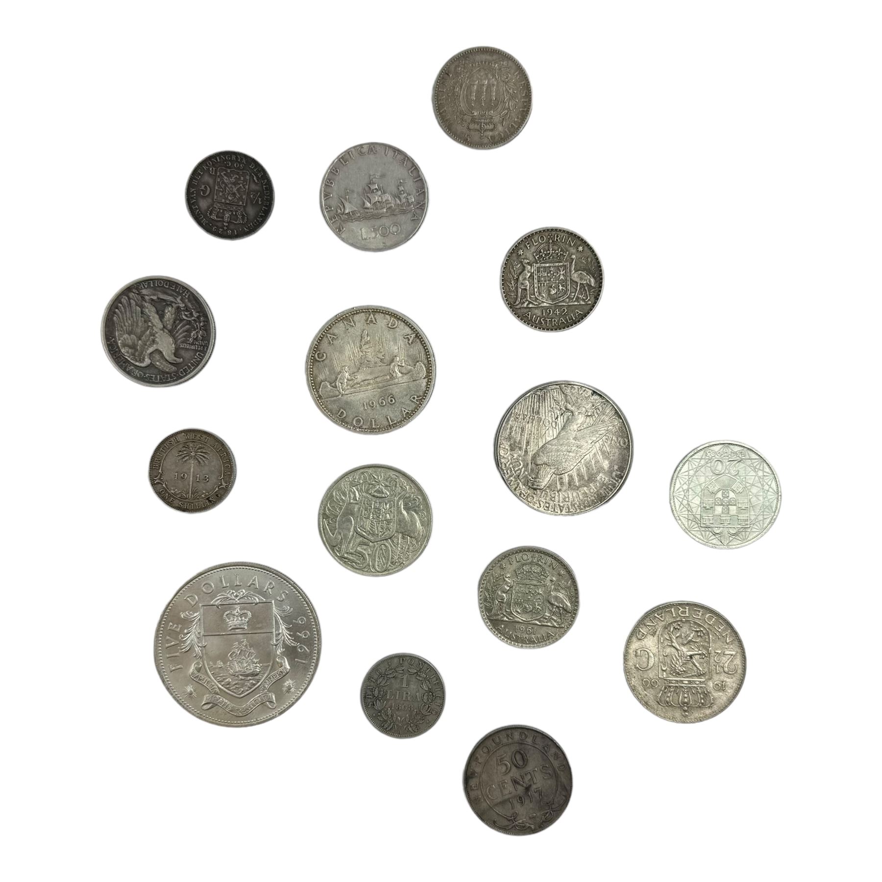 World coins in silver, including King George V British West Africa 1913 one shilling, United States of America 1922 peace dollar and 1939 half dollar, Queen Elizabeth II Australia 1961 one florin, Bahama Islands 1966 five dollars, Canada 1966 one dollar etc, overall weight approximately 210 grams