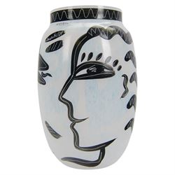 Kosta Boda Open Minds glass footed bowl, the clear glass bowl painted with female facial features, together with a Kosta Boda Caramba vase, of baluster form painted in black with a head in profile and a two headed beast on a white ground, both designed by Ulrica Hydman-Vallien, tallest H19.5cm