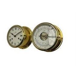 Eight-day 20th century brass cased “Schatz Royal Mariner” bulkhead clock, with a 6” dial, Roman numerals and minute track, bells on/off control, black spade hands with a brass bezel and flat bevelled glass, twin train spring driven balance wheel movement sounding the ships watches on a bell.
With a corresponding and matching Schatz open dial compensated aneroid barometer, with weather predictions and measuring barometric pressure in inches and millibars, with a curved spirit thermometer measuring temperature in Fahrenheit and Celsius, steel indicating hand and brass recording hand.
