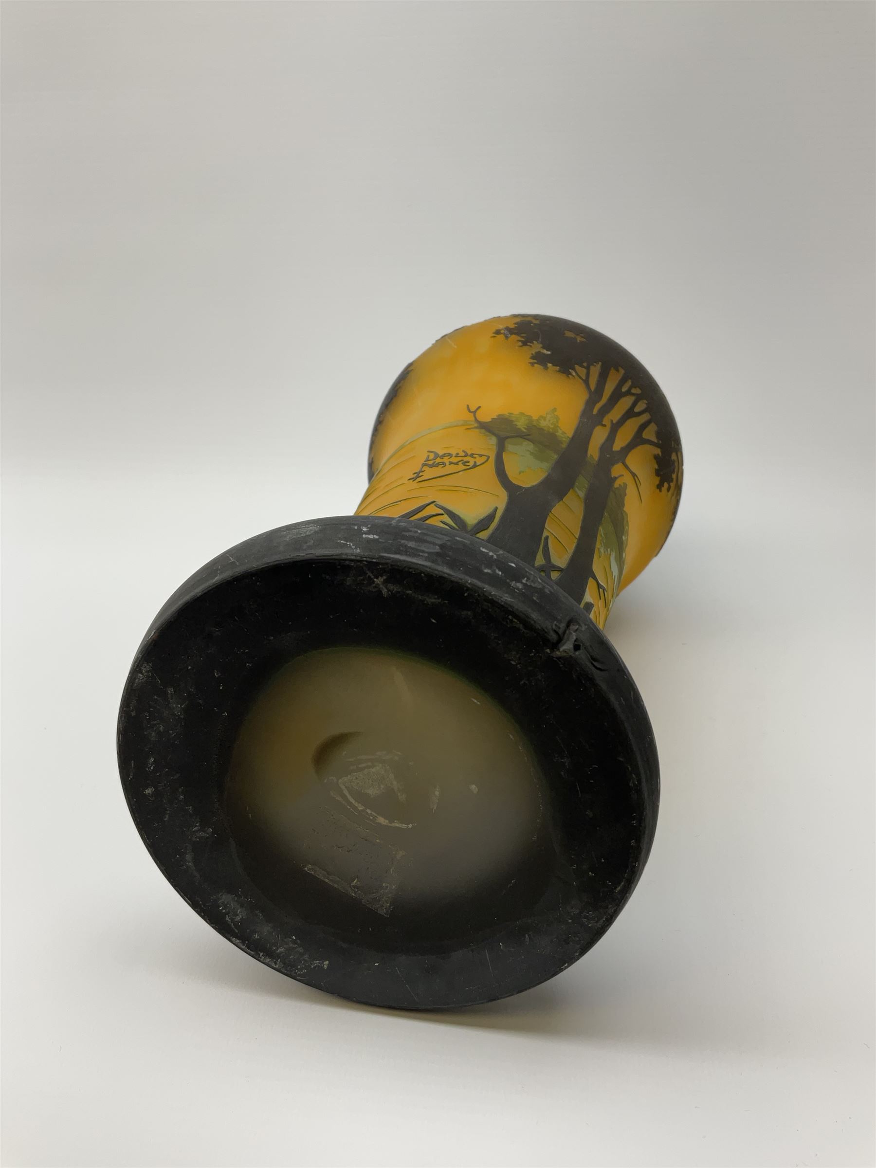 Reproduction Daum Nancy art nouveau style overlay and cut glass vase  decorated with woodland and a lake scene on a yellow ground, H35cm. 