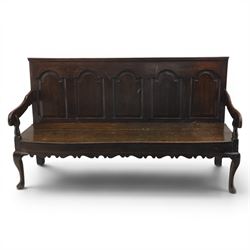 George III oak settle bench, with five gothic arched field panels, with downswept arms raised on cabriole supports