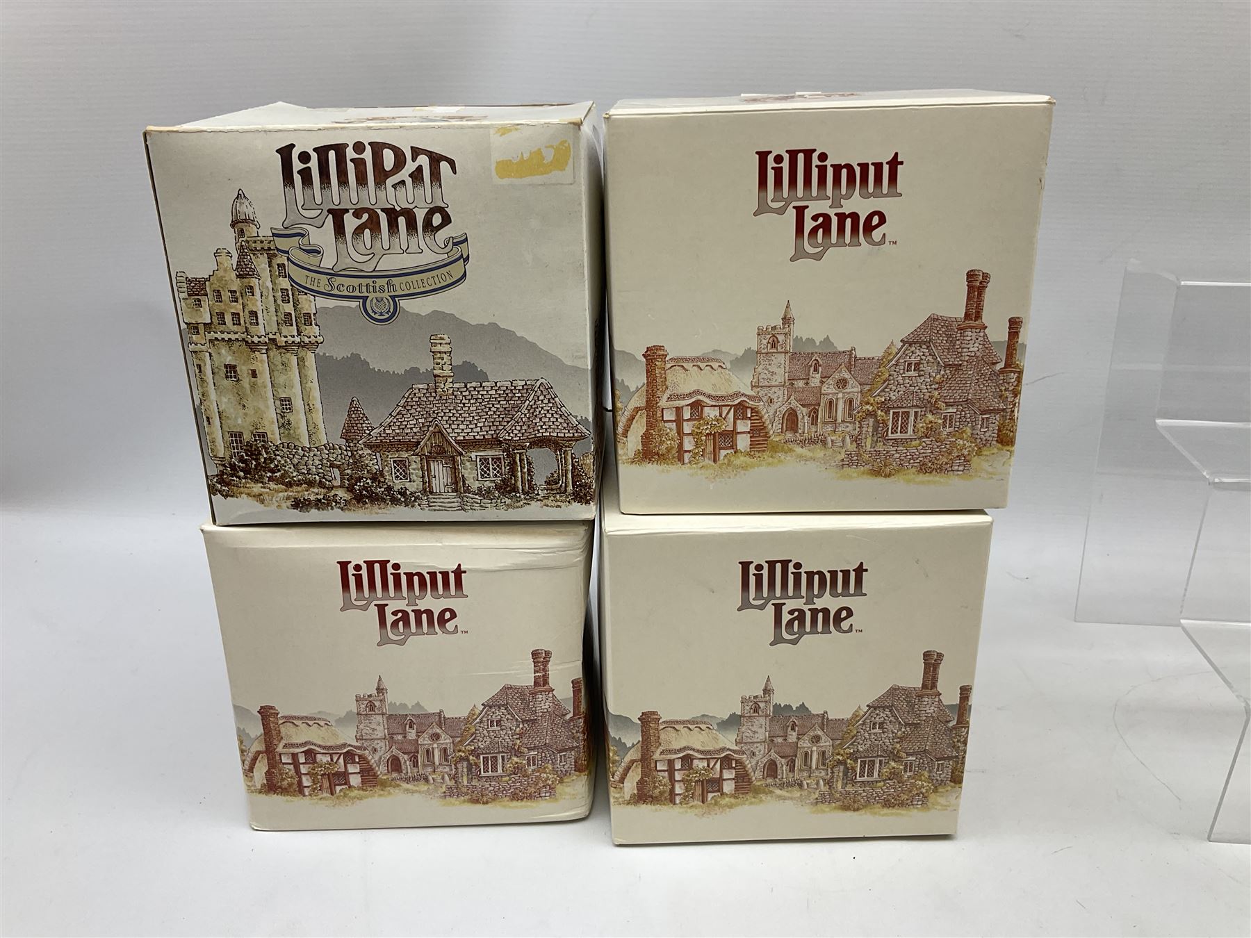 Four limited edition Lilliput Lane cottages, comprising Stockwell Tenement from the Scottish collection, Forget-Me-Not, Cotman Cottage and Stokesay Castle, all boxed with deeds