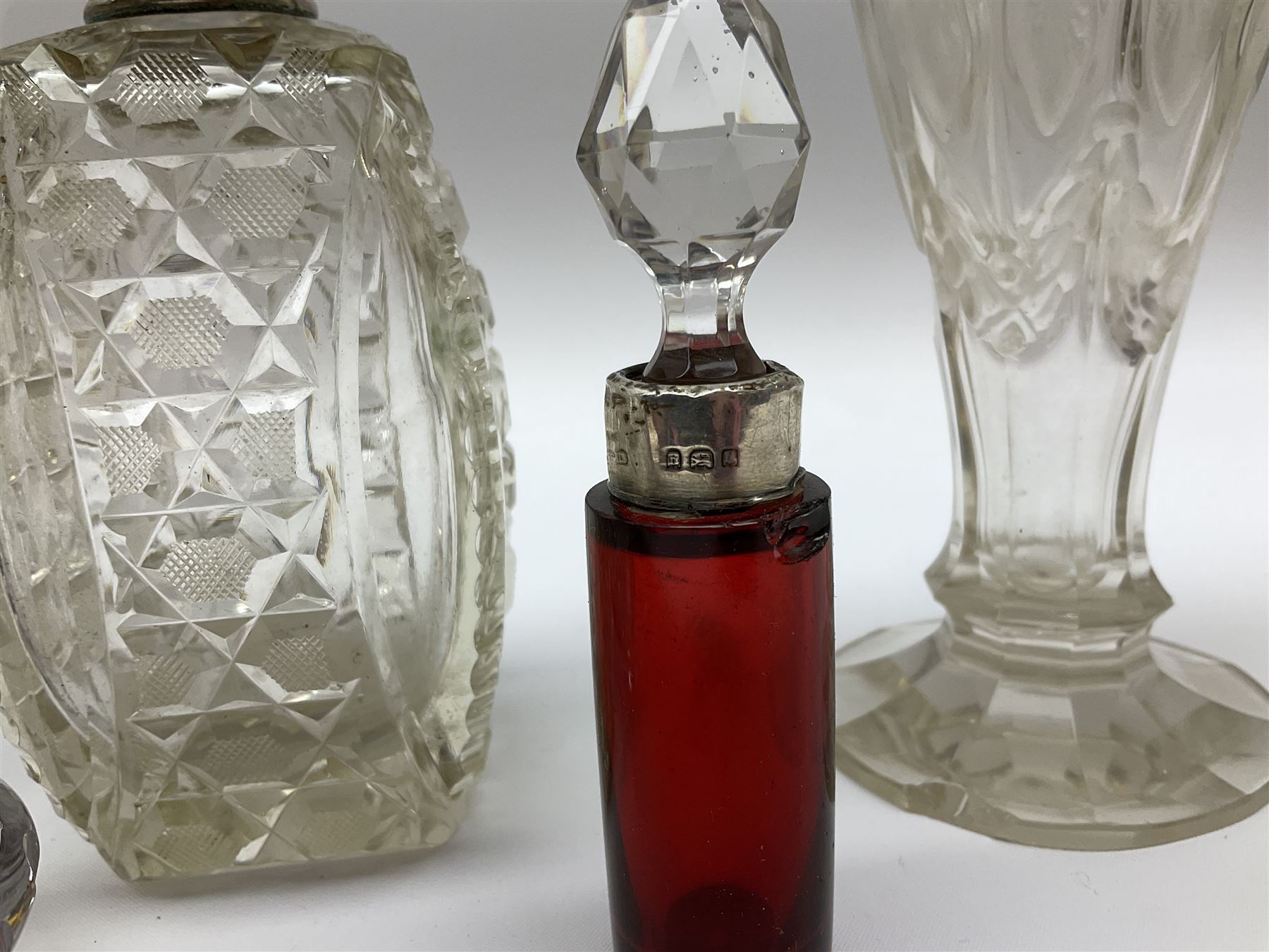 Group of silver mounted glass scent bottles and crested ware, together with a Brierglass lead crystal box with a glass and silver, lid, etc all silver with various hallmarks. 