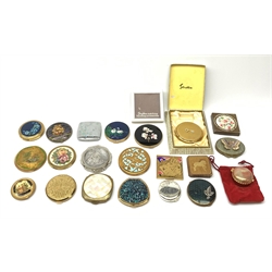 Twenty powder compacts/mirrors by Stratton, Kigu etc including butterfly wing, Paua shell, mother-of-pearl, petit point, Ohio state map etc, four in boxes; and a L'Aimant commemorative porcelain box