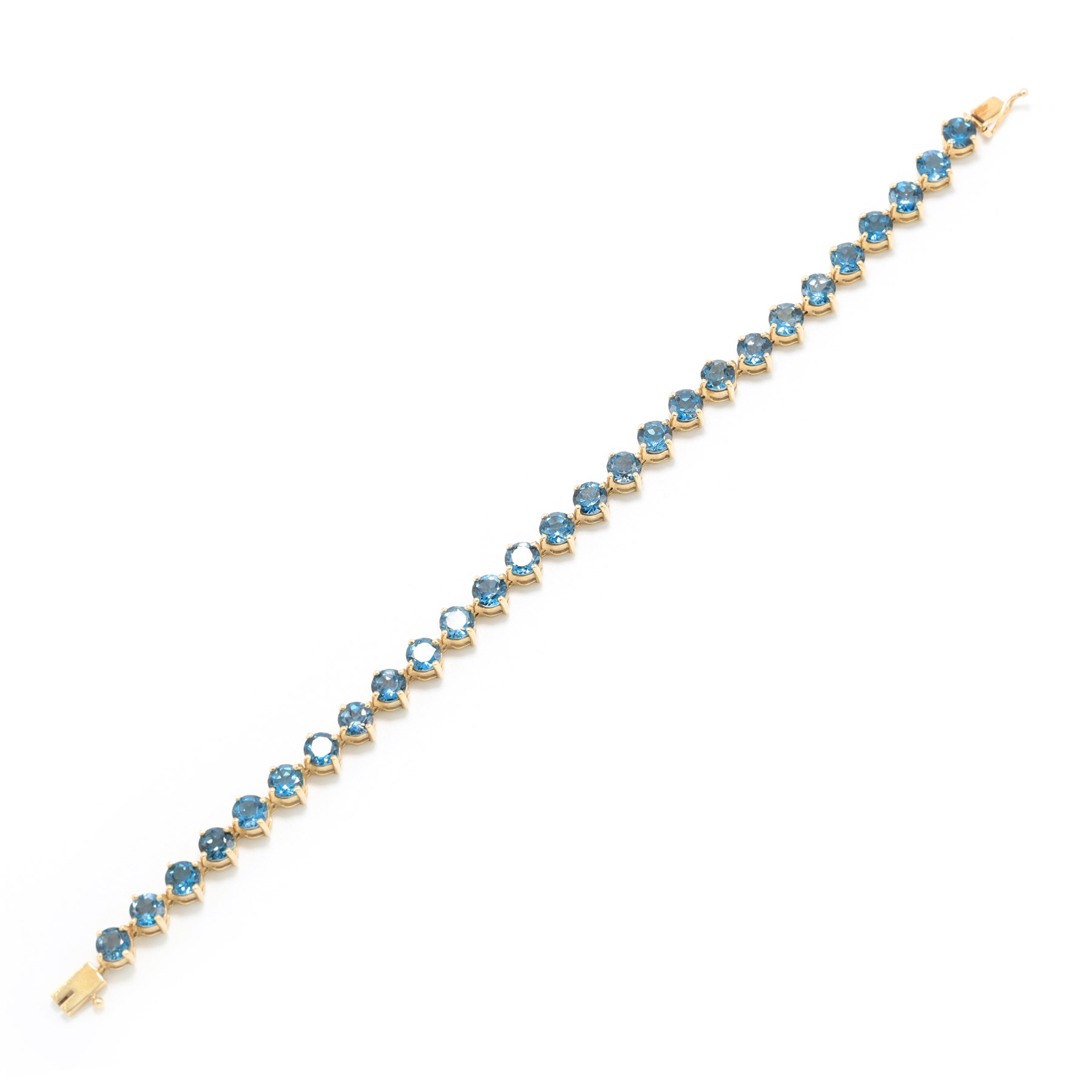 9ct gold London blue topaz bracelet, set with twenty-seven round cut topaz's, Birmingham 2006