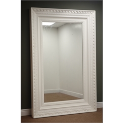  Large moulded white finish mirror with dentil and egg and dart detailing, W128cm, H197cm, D14cm  