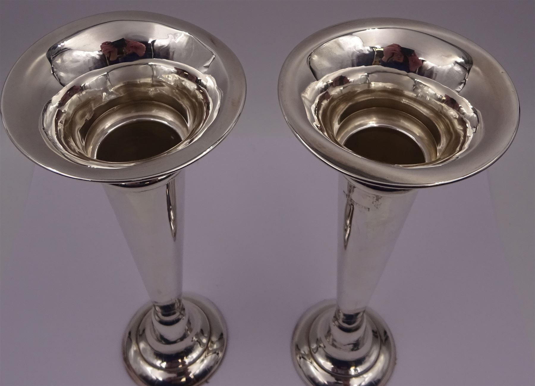 Pair of modern silver trumpet vases, each with fluted rim, upon tapering stem and slightly domed weighted circular foot, hallmarked Charles S Green & Co Ltd, Birmingham 1971, H20cm
