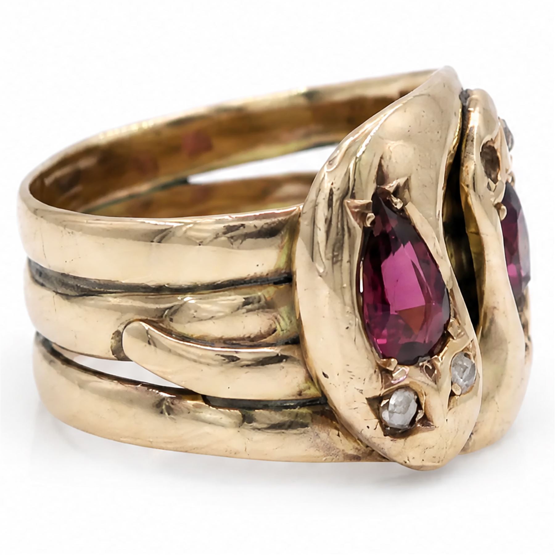 Edwardian 9ct rose gold garnet and diamond double coiled snake ring, set with rose cut diamonds and pear cut garnet, Chester 1907