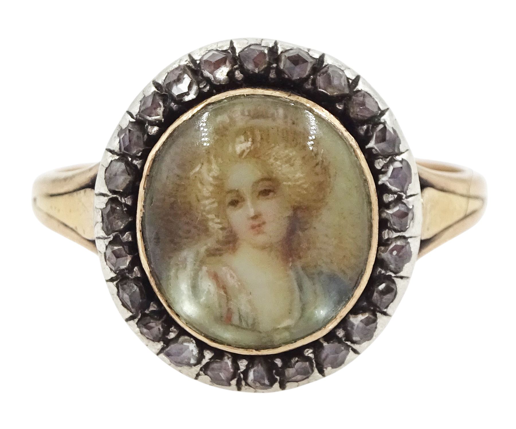 19th century French 18ct gold and silver diamond portrait ring, set with an oval miniature of a woman in 18th century dress on ivory, under a glazed panel, with rose cut diamond surround and trifurcated shoulders, hallmarked. This lot has been registered for sale under Section 10 of the APHA Ivory Act