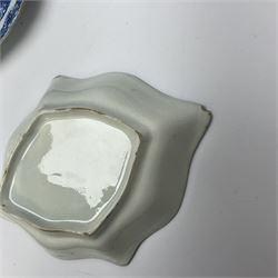 A group of 19th century blue and white transfer printed pottery, various makers and patterns, to include Minton Queen of Sheba pattern plate, Joshua Heath Reindeer pattern plate with towering pagoda, and seal in the foreground, a number of plates decorated in the Chinoiserie Bridgeless pattern, two Mandarin type pattern plates, possibly Spode, etc. 