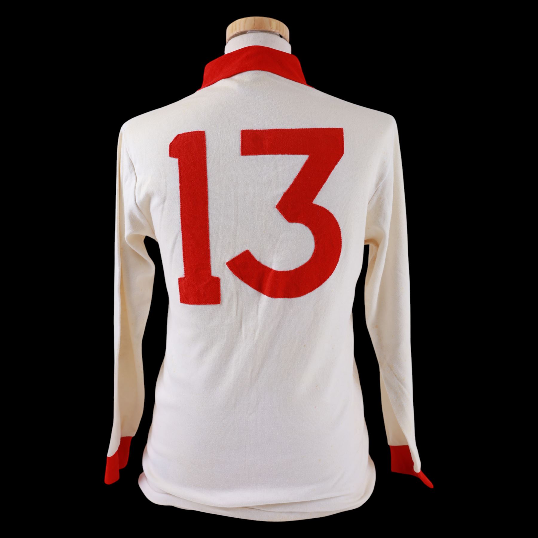 1960s Scarborough FC long sleeved football shirt, all white with red cuffs and collar, red umbro logo, stitched red SFC logo and red number 13 to back, with Umbro International label inside collar