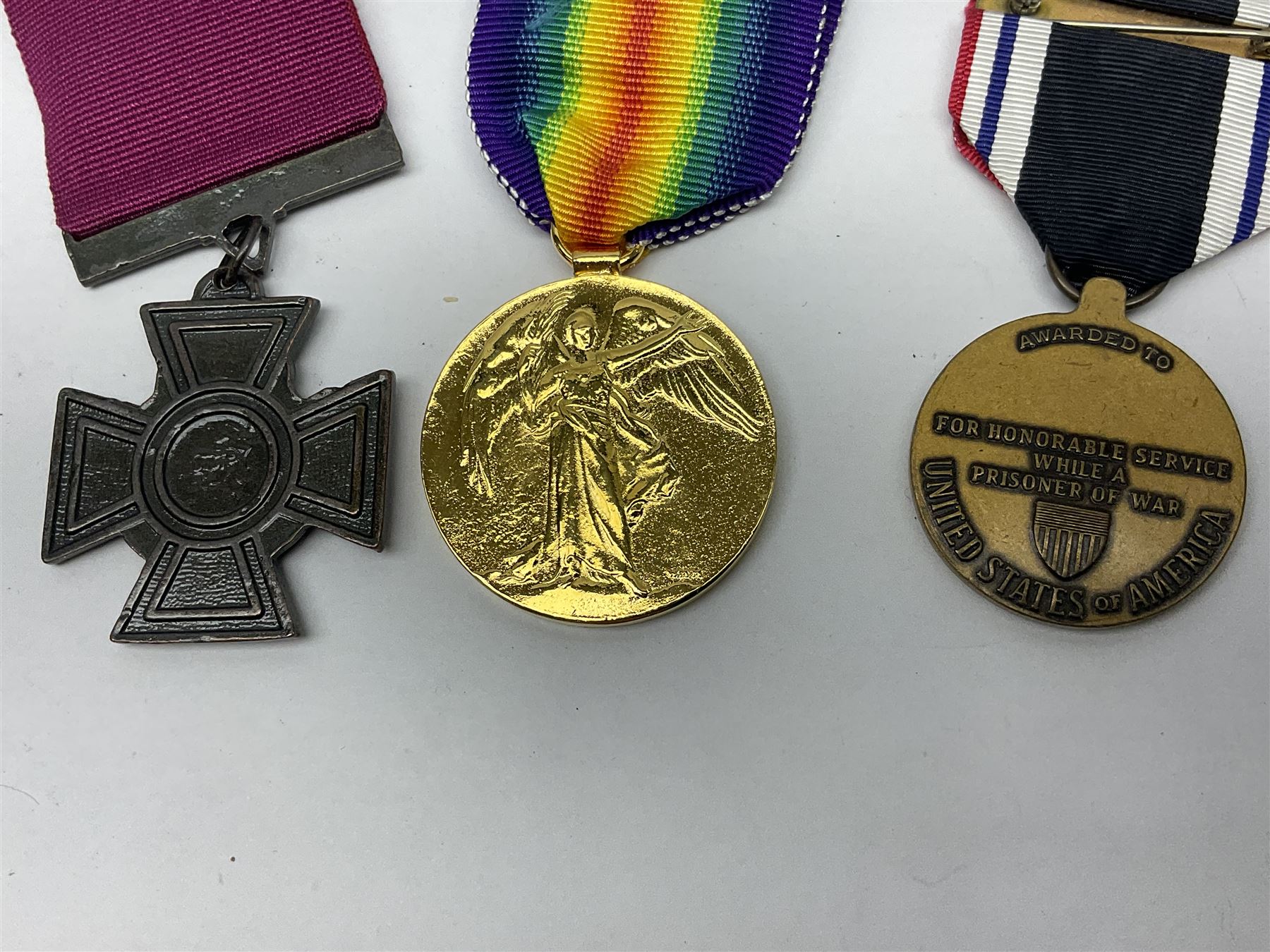 Gaunt & Son Territorial Force Nursing Service cape medal; cased; WW1 British War Medal and 1914-15 Star (names erased); two MID oak leaves; Polish and American medals; eight replica medals including VC, MM, Air Crew Europe Star etc and replica group of five WW2 miniatures etc