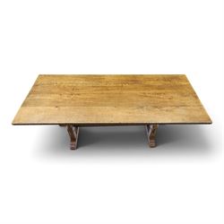 Rupert Griffiths for Monastic Woodcraft - oak 6ft refectory dining table with set six (4+2) matching chairs, rectangular top with arcaded frieze, with trestle base with further arcaded carved stretchers, chairs with carved rails and finials, leather wrapped seats with stud detail, turned supports united by carved stretcher