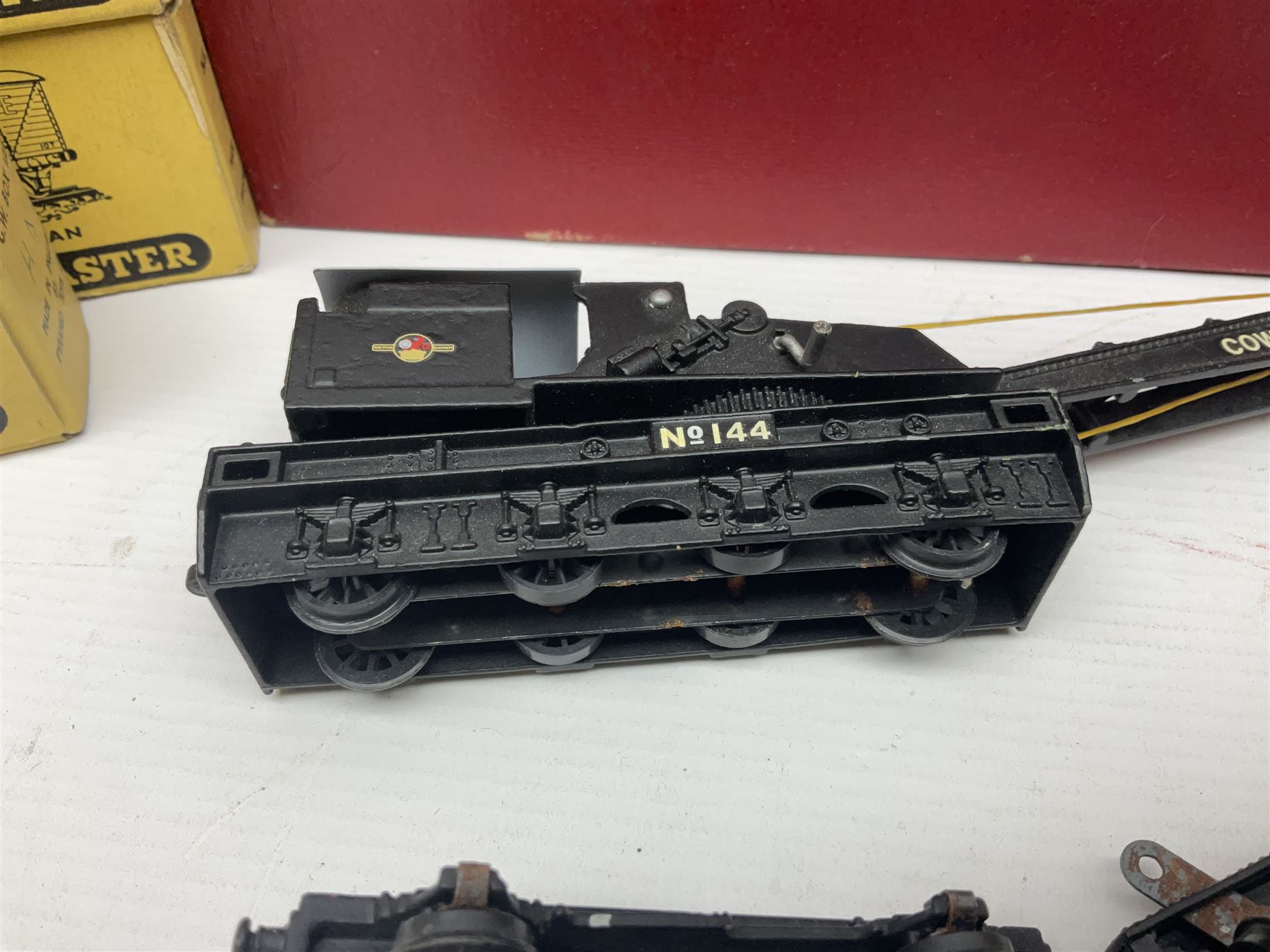 Hornby Dublo - 4620 Breakdown Crane No.133 in red with Match Trucks; boxed; another unboxed 4620 Breakdown Crane No.144 in black 'Cowans Sheldon' with Match Trucks; and nine Trackmaster goods wagons comprising three GW Open Wagons, two GW box vans, three NE Open Wagons and one NE Box Van; all boxed (11)