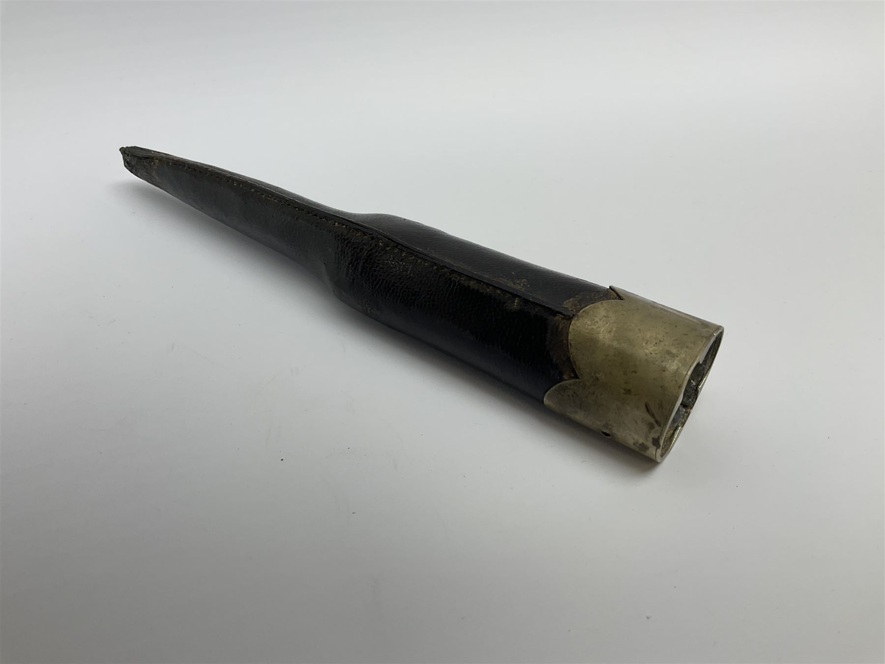 Rare double barrel percussion knife pistol by Dumonthier & Sons (NVN), approx. .38 calibre, with 8.5cm barrels and central 21.5cm spear pointed blade, all with etched damascening, upper quillons serve as hammers for the percussion ignition with single drop down trigger and fluted nickel grips, in nickel mounted leather covered tin scabbard L33.5cm overall