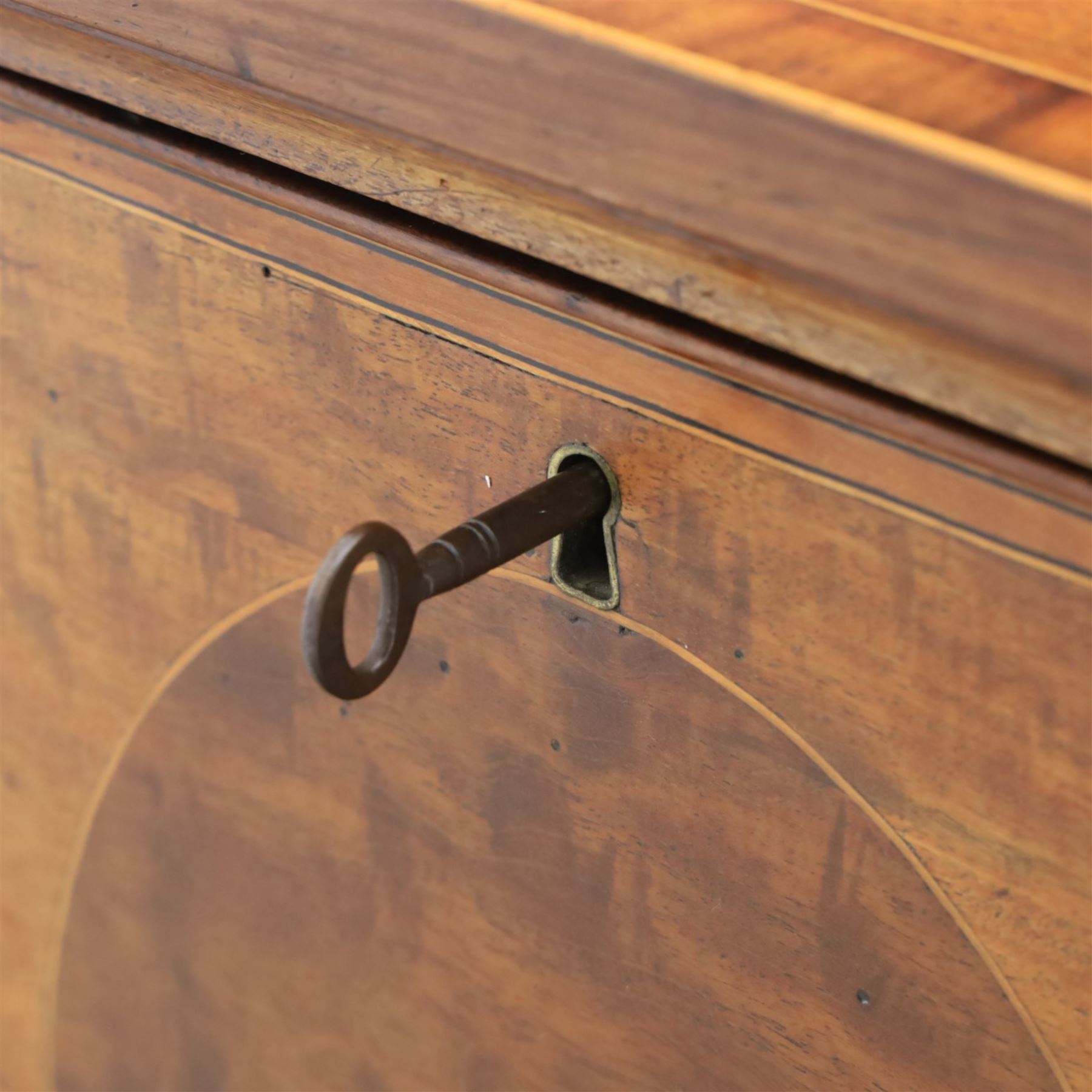 George III Sheraton design serpentine inlaid mahogany and satinwood sideboard