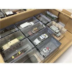 Fabbri James Bond Collection - over one hundred and ten die-cast models in perspex display cases as issued periodically; and a quantity of associated magazines and trading cards, in five boxes