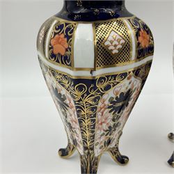 Pair of early 20th century Royal Crown Derby Imari 1128 pattern vases, of tapering straight sided form with waisted neck and frilled rim, upon four splayed feet, with printed and painted marks beneath including illustration date codes for 1911 and 1920, H17cm