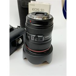 Canon EOS 5D camera body with Canon 'BG-E6' battery grip, Canon 'Speedlite 580EXII' flash and Canon lens 'Canon Zoom Lens EF 24-105mm 1:4 L IS USM' with Canon EOS 5D Mark II instruction manual