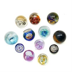 Seven Caithness large glass paperweights including Utopia 143/650, Messenger 40/750, Intrigue 513/750, Fascination etc and five smaller including Trapeze, Reflections etc all boxed